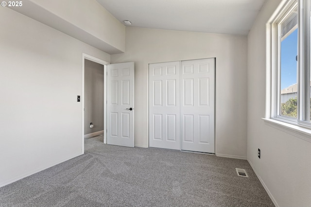 17006 SE 6th St, Vancouver, WA 98684 - unfurnished bedroom featuring carpet flooring, a closet, baseboards, and lofted ceiling