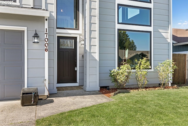 17006 SE 6th St, Vancouver, WA 98684 - doorway to property with a garage and a yard