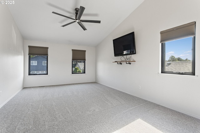 17006 SE 6th St, Vancouver, WA 98684 - carpeted empty room with vaulted ceiling, healthy amount of natural light, a ceiling fan, and baseboards