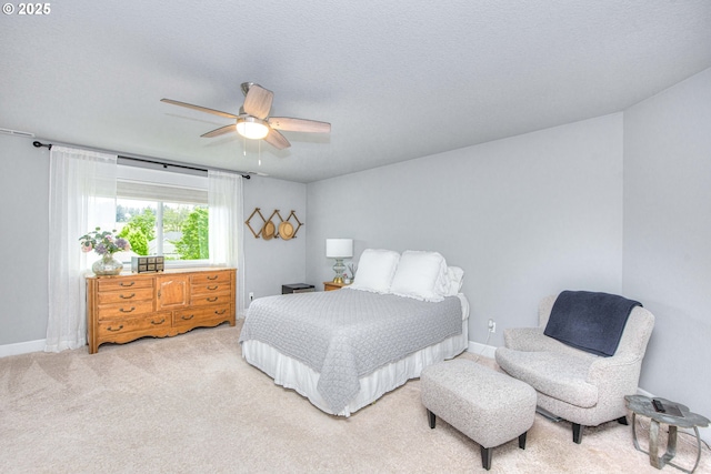 15928 Stables Pl, Oregon City, OR 97045 - bedroom featuring light colored carpet, a ceiling fan, and baseboards