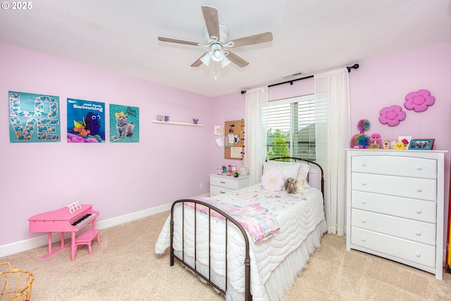 15928 Stables Pl, Oregon City, OR 97045 - carpeted bedroom with a ceiling fan, baseboards, and visible vents