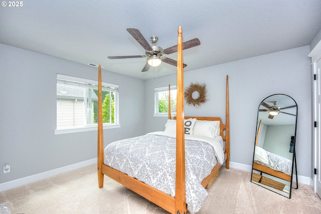 15928 Stables Pl, Oregon City, OR 97045 - carpeted bedroom featuring baseboards, ceiling fan, and visible vents