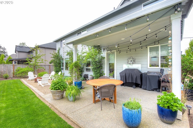 15928 Stables Pl, Oregon City, OR 97045 - view of patio with outdoor dining space, fence, and a grill