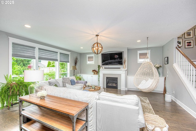 15928 Stables Pl, Oregon City, OR 97045 - living area with a wealth of natural light, stairway, and wood finished floors