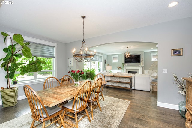 15928 Stables Pl, Oregon City, OR 97045 - dining space with baseboards, a healthy amount of sunlight, and a fireplace