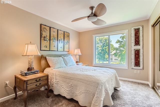 bedroom featuring carpet flooring, ceiling fan, and ornamental molding