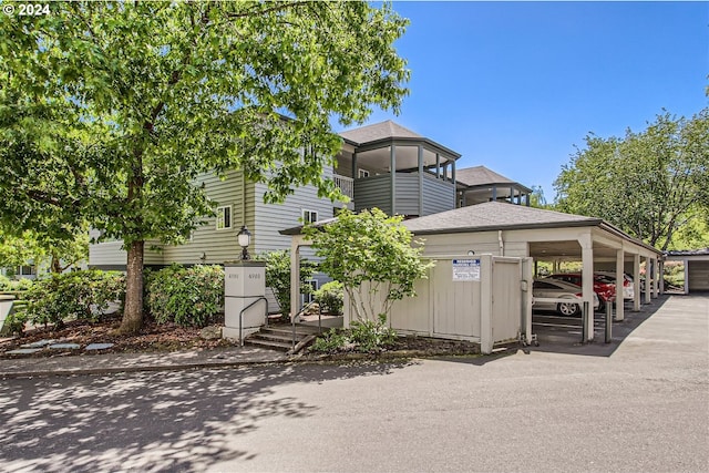 view of front of property with a carport