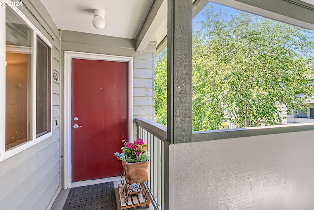 entrance to property with a balcony