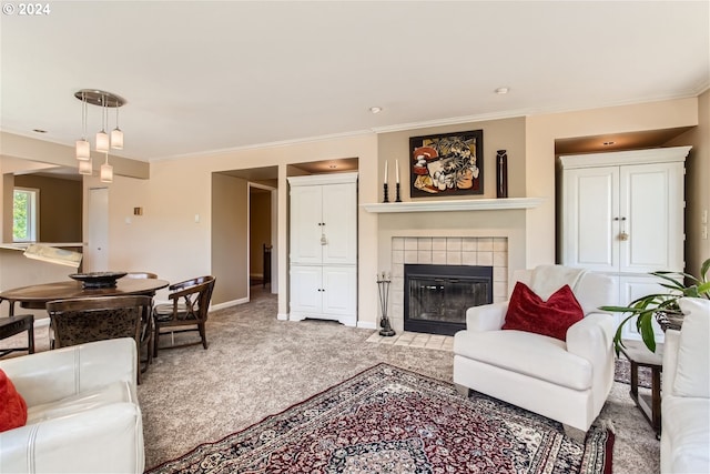 carpeted living room featuring a fireplace and ornamental molding