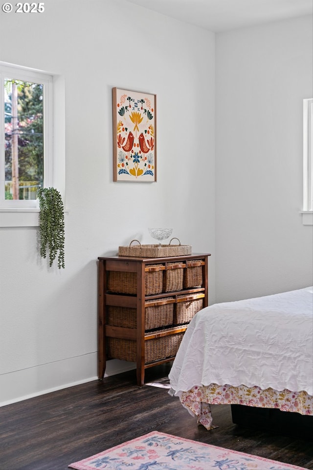 1605 SE 46th Ave, Portland, OR 97215 - bedroom featuring wood finished floors and baseboards