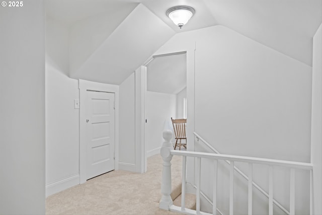 1605 SE 46th Ave, Portland, OR 97215 - hallway featuring an upstairs landing, carpet floors, and vaulted ceiling