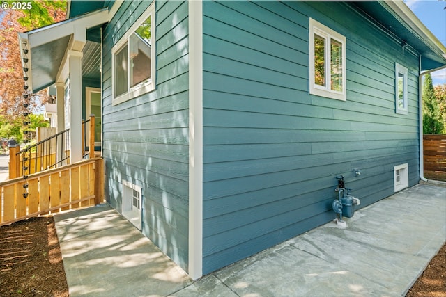 1605 SE 46th Ave, Portland, OR 97215 - view of property exterior with a patio