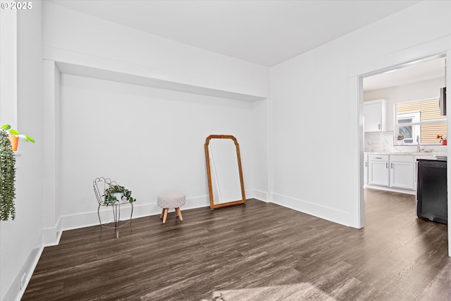 1605 SE 46th Ave, Portland, OR 97215 - unfurnished room with dark wood-type flooring and baseboards