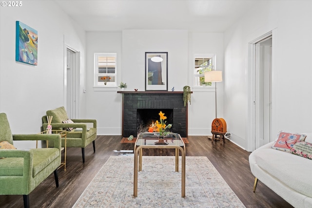 1605 SE 46th Ave, Portland, OR 97215 - living room featuring dark wood finished floors and a brick fireplace
