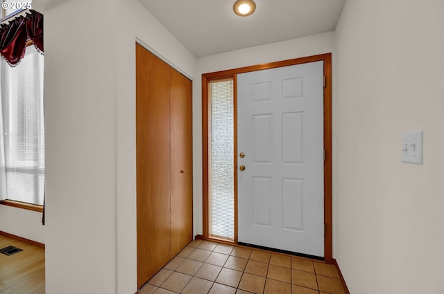 4095 Eddystone Pl, Eugene, OR 97404 - foyer entrance with baseboards and light tile patterned flooring