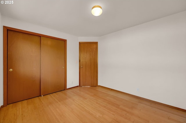 4095 Eddystone Pl, Eugene, OR 97404 - unfurnished bedroom with light wood finished floors and baseboards