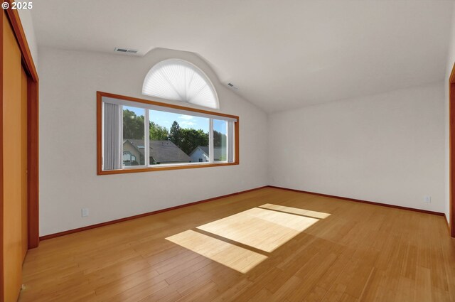 4095 Eddystone Pl, Eugene, OR 97404 - bonus room with lofted ceiling, light wood-style flooring, and baseboards