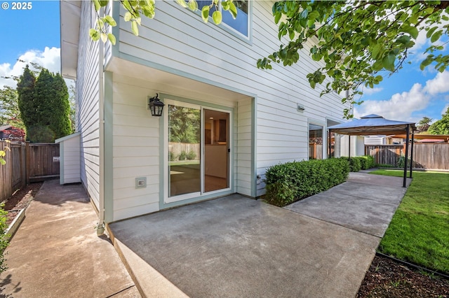 4095 Eddystone Pl, Eugene, OR 97404 - view of exterior entry with a patio area and fence
