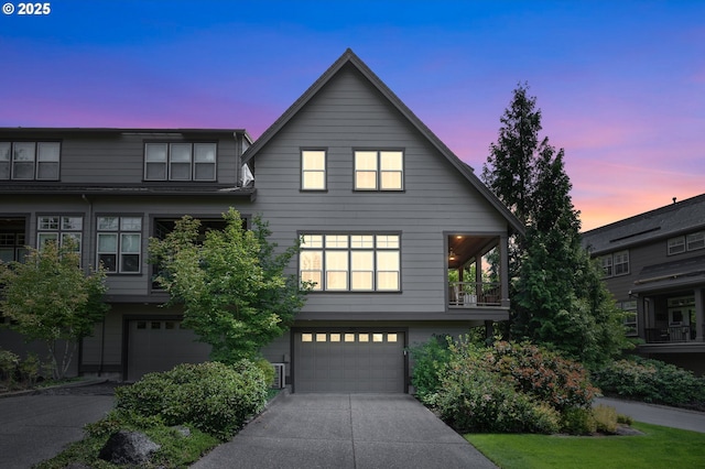 10155 SW Morrison St, Portland, OR 97225 - view of front facade with a garage and concrete driveway