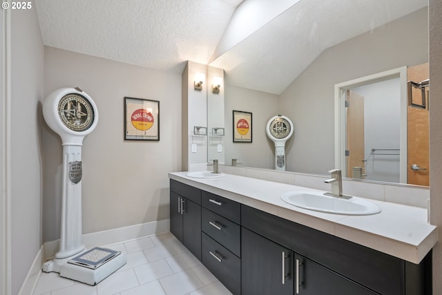 10155 SW Morrison St, Portland, OR 97225 - full bathroom with vaulted ceiling, tile patterned flooring, and double vanity