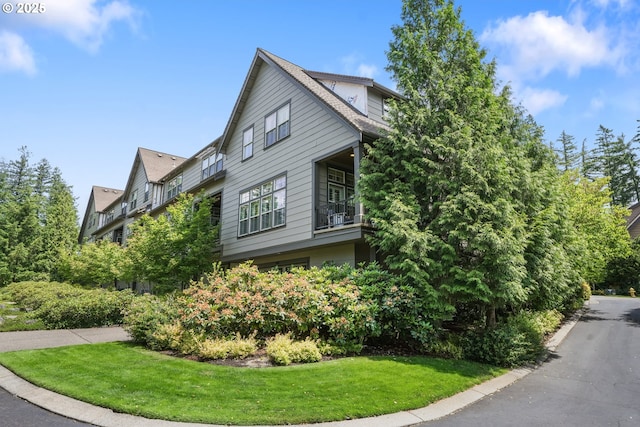 10155 SW Morrison St, Portland, OR 97225 - view of property exterior with a lawn