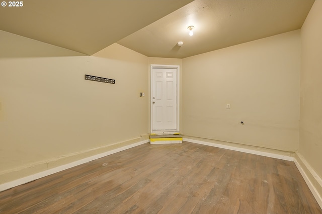 spare room featuring hardwood / wood-style flooring