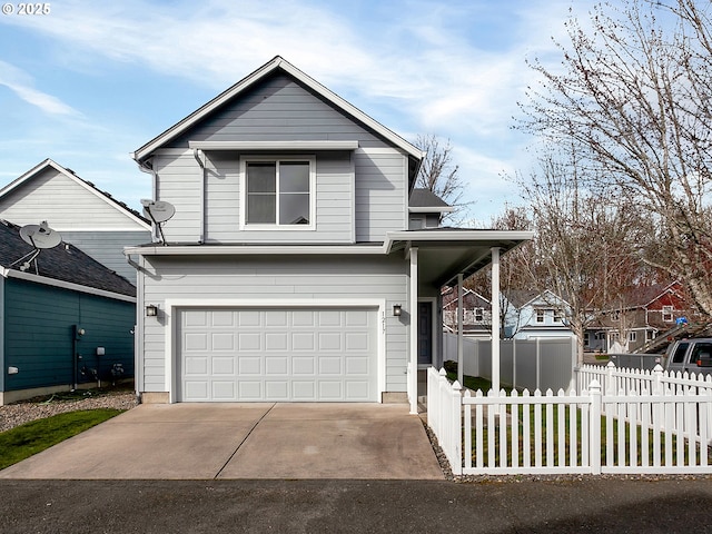 view of front facade featuring driveway, an attached garage, and fence