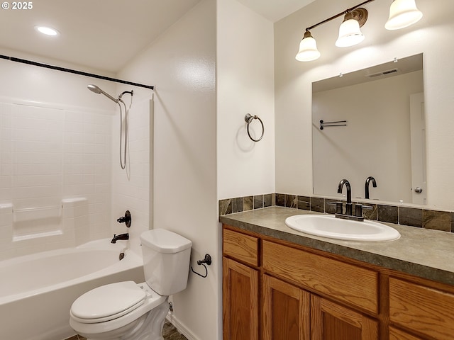 full bathroom featuring visible vents, toilet, bathtub / shower combination, and vanity