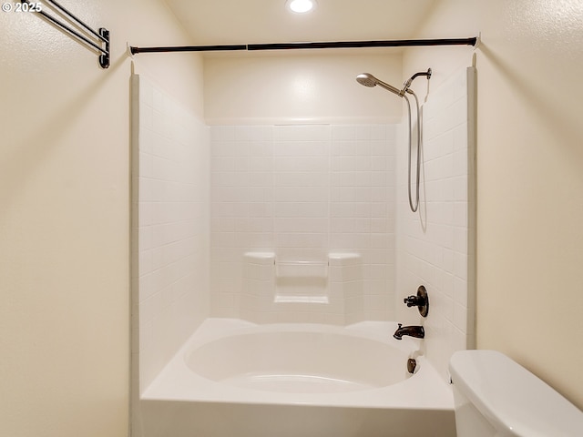 bathroom with toilet and shower / washtub combination