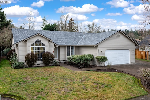 ranch-style home with a garage and a front yard