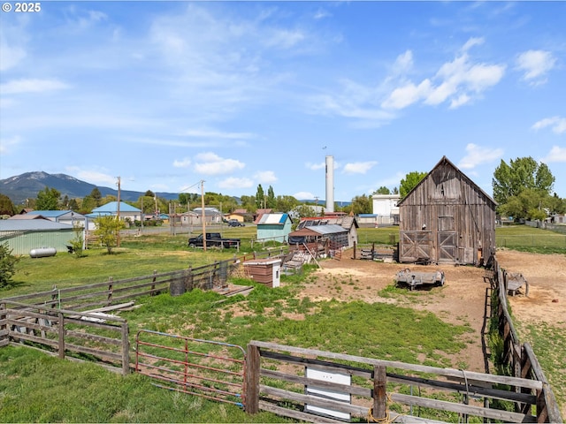 710 School St, Haines, OR 97833 - view of yard with a barn, an outdoor structure, and a view of rural / pastoral area