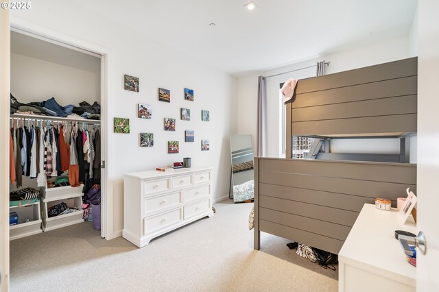 1075 NW Northrup St Unit 814, Portland, OR 97209 - bedroom with a closet and light carpet