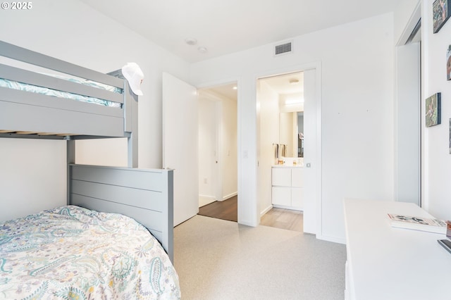 1075 NW Northrup St Unit 814, Portland, OR 97209 - bedroom featuring baseboards and visible vents