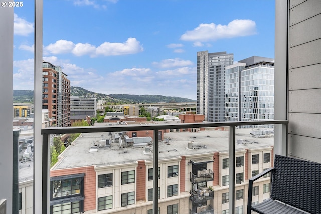 1075 NW Northrup St Unit 814, Portland, OR 97209 - balcony featuring a mountain view and a city view