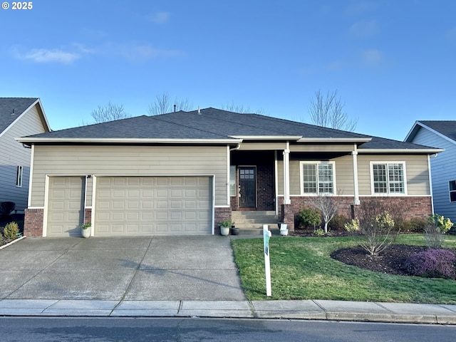 view of front of house with a front lawn and a garage