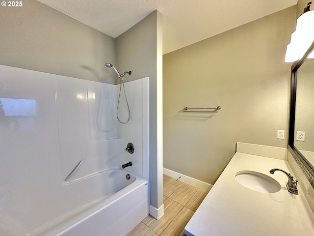 bathroom featuring vanity and bathtub / shower combination