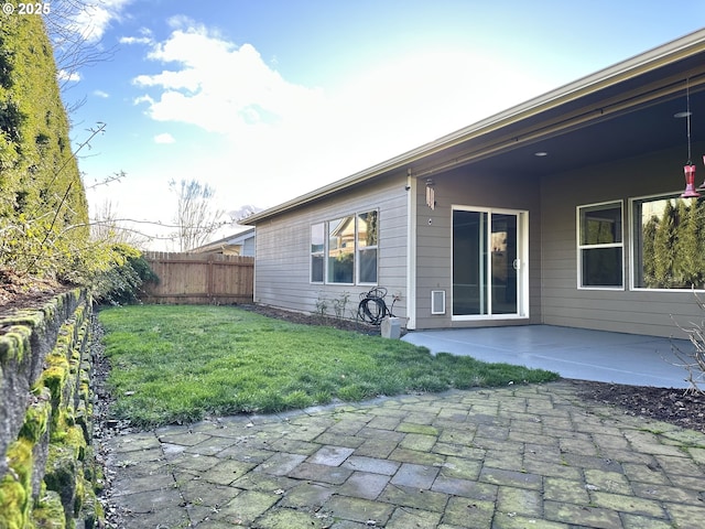 exterior space with a yard and a patio