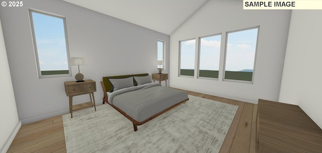 bedroom featuring lofted ceiling, hardwood / wood-style floors, and multiple windows