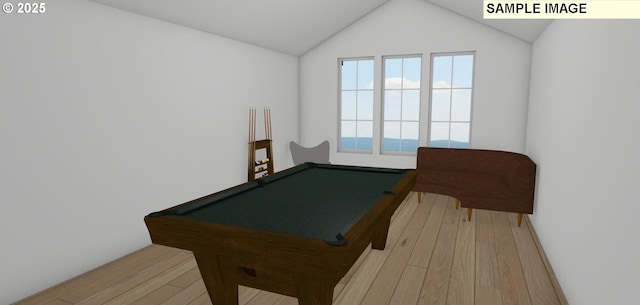 game room featuring pool table, lofted ceiling, and light wood-type flooring