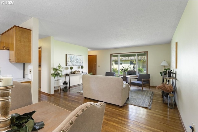 12395 SE Main St, Portland, OR 97233 - living area with wood finished floors and a textured ceiling