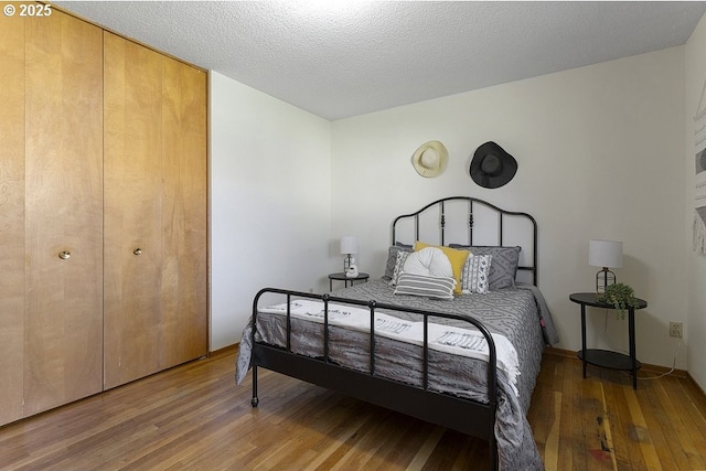 12395 SE Main St, Portland, OR 97233 - bedroom featuring wood finished floors and a closet