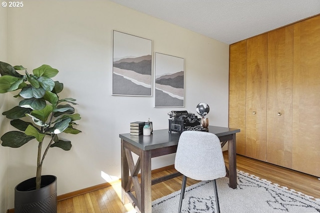12395 SE Main St, Portland, OR 97233 - office area featuring light wood-style floors and baseboards