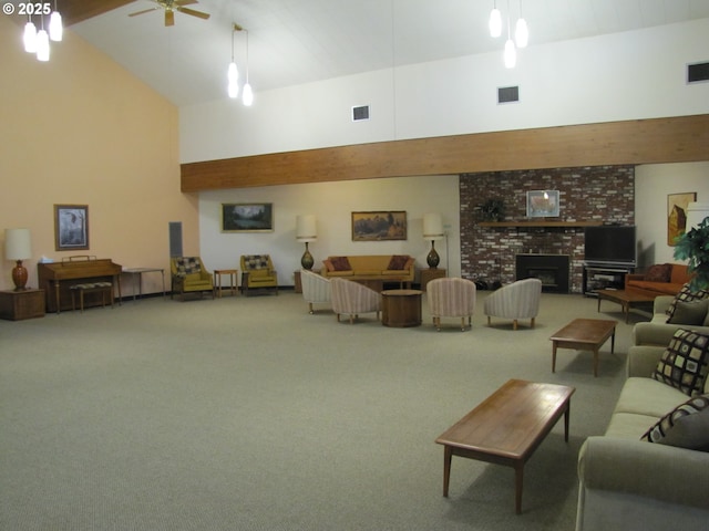 12395 SE Main St, Portland, OR 97233 - living room with high vaulted ceiling, carpet, a brick fireplace, a ceiling fan, and beam ceiling