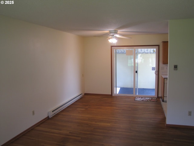 unfurnished room featuring baseboard heating, ceiling fan, and dark wood-type flooring