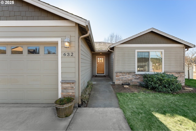 doorway to property with a yard