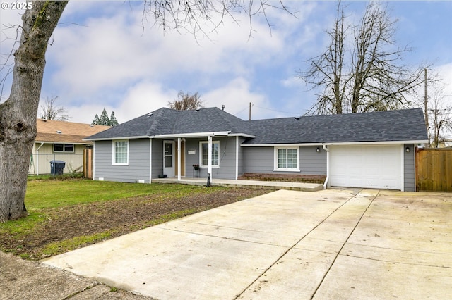 ranch-style house featuring a garage and a front lawn