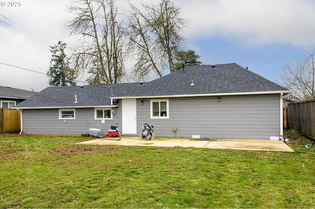 rear view of property with a patio area and a lawn