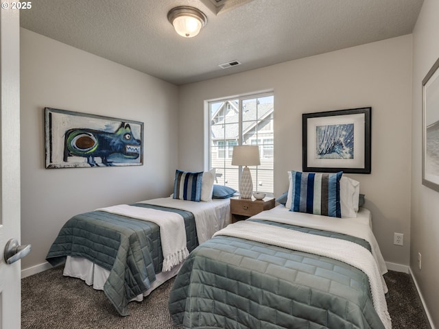 11656 SW Auklet Loop, Beaverton, OR 97007 - carpeted bedroom featuring baseboards and a textured ceiling
