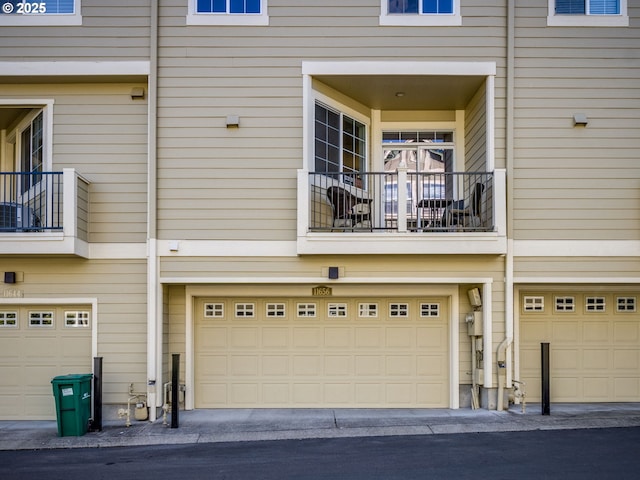 11656 SW Auklet Loop, Beaverton, OR 97007 - rear view of house featuring an attached garage