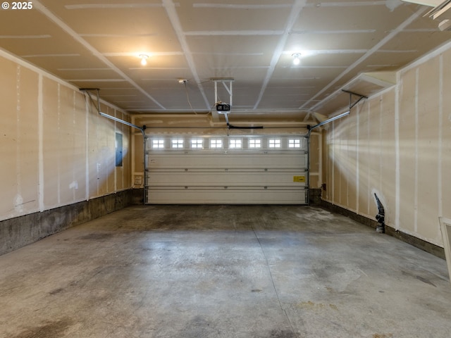 11656 SW Auklet Loop, Beaverton, OR 97007 - garage featuring a garage door opener